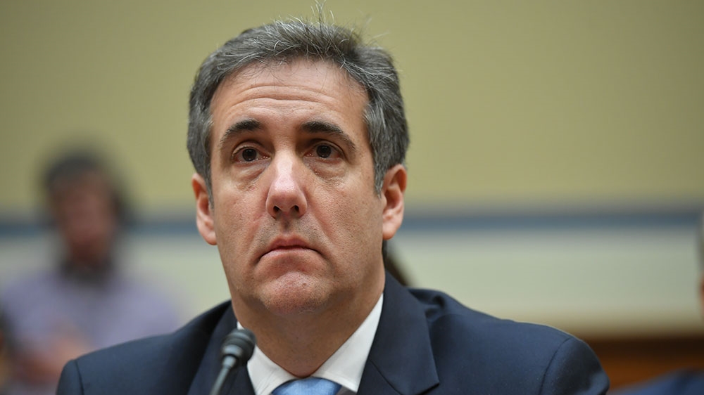 Michael Cohen arrives to testify before the House Oversight and Reform Committee [File: Mandel Ngan/AFP]
