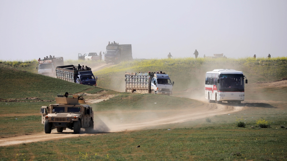 Reporters saw dozens of trucks carrying civilians leave Baghouz on Friday [Rodi Said/ Reuters]