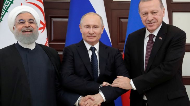Iranian President Hassan Rouhani, Russian President Vladimir Putin and Turkish President Recep Tayyip Erdogan meet in the Black sea resort of Sochi