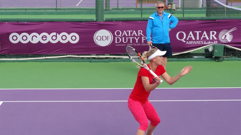 Former world number one Caroline Wozniacki on the practise court in Doha [Saba Aziz/Al Jazeera]
