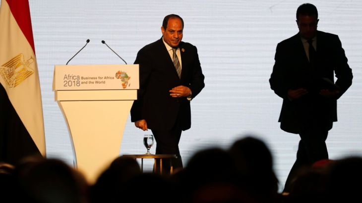 Egyptian President Abdel Fattah al-Sisi leaves the podium after speaking during Africa 2018 Forum at the Red Sea resort of Sharm el-Sheikh