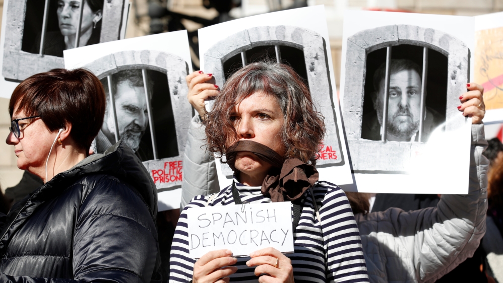People protest against the trial at Sant Jaume square in Barcelona [Albert Gea/Reuters]