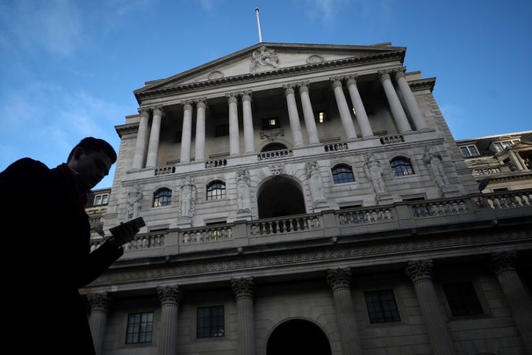 A man walks past the Bank of England in the City of London, Britain, February 7, 2019