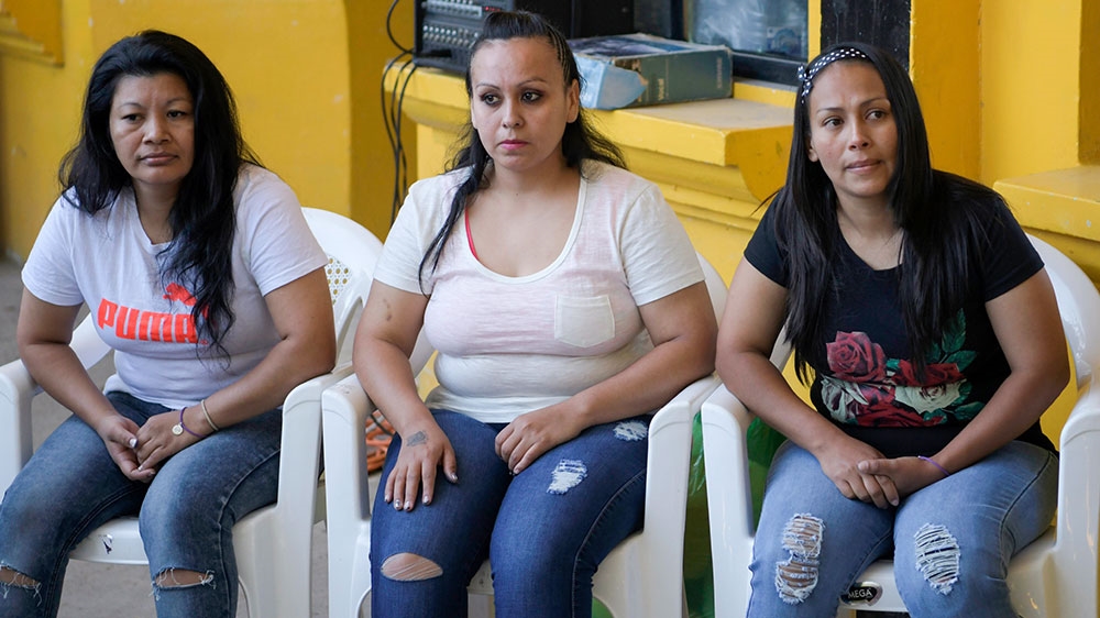 Maria del Transito Orellana (left), Cinthia Marcela Rodriguez (centre) and Alba Lorena Rodriguez are pictured before being released from the women's prison in Ilopango [Marvin Recinos/AFP] 