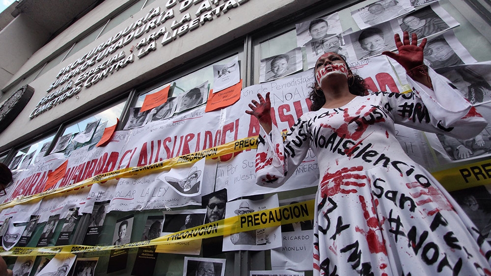 Protesters call for justice after attacks on journalists in Mexico [Sashenka Gutierrez/EPA]