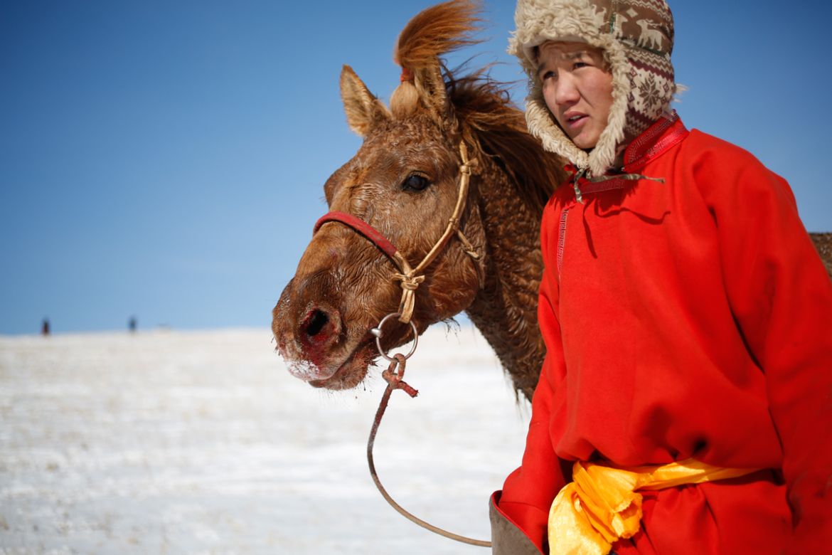 A common Mongolian proverb says, “A Mongol without a horse is like a bird without wings.” [Davaanyam Delgerjargal/Al Jazeera]