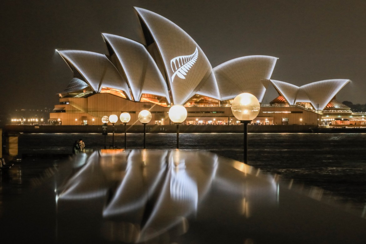 This hand out picture taken by Salty Dingo and released by the New South Wales (NSW) Government on March 17, 2019 shows the sails of the Sydney Opera House seen lit with the design of New Zealand''s si