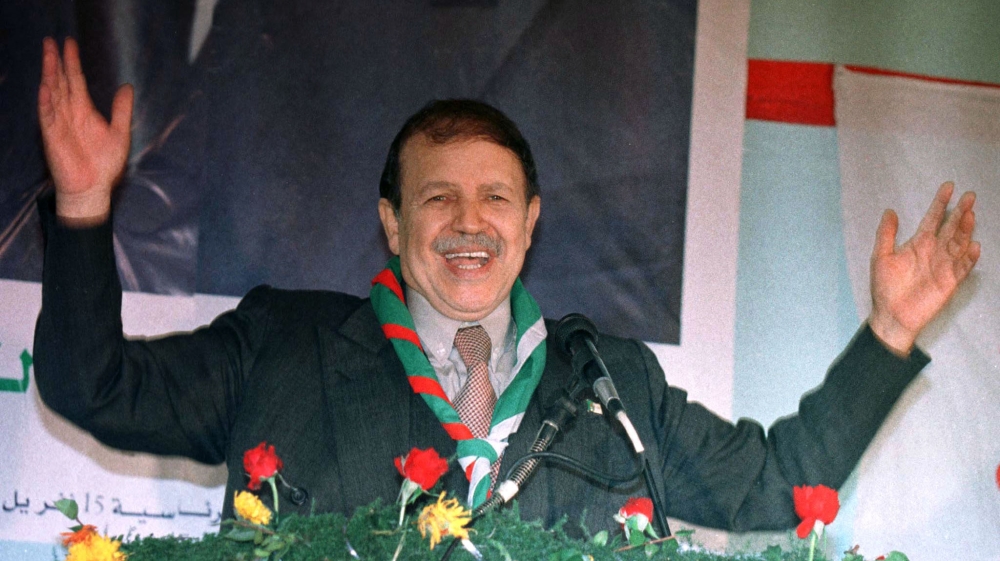 Bouteflika gestures broadly during a campaign speech in 1999 [Zohra Bensemra/Reuters] 