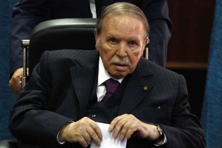 Algerian President Abdelaziz Bouteflika prepares to vote in Algiers, Thursday, May 4, 2017. Algerians vote Thursday in parliamentary elections the government hopes will give it a mandate as it struggl