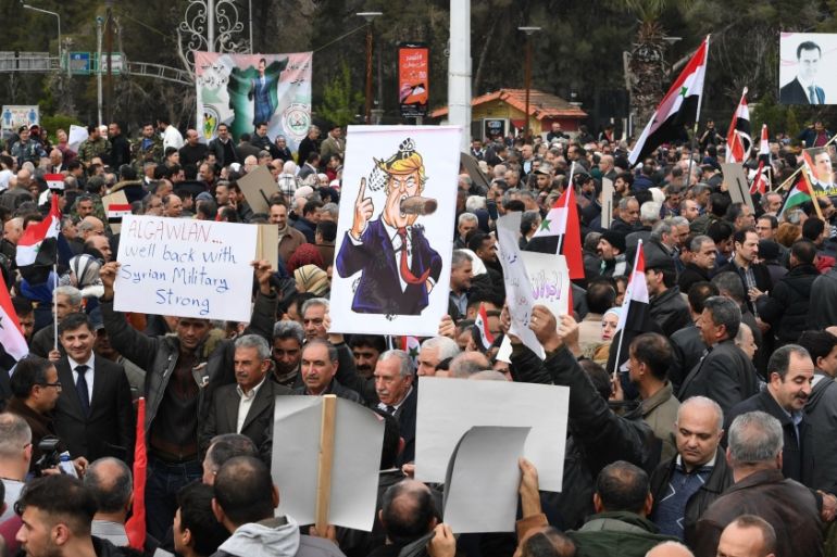 Syrians protest in the northern city of Aleppo against the US'' decision to recognise Israel''s sovereignty over the Golan Heights on March 26, 2019. Demonstrations spread across Syria today denouncing
