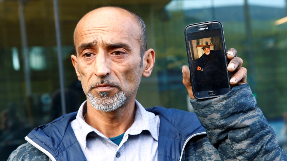 Omar Nabi speaks to the media about losing his father, Haji Daoud Nabi, in the mosque attacks, at the District Court in Christchurch [Edgar Su/Reuters] 