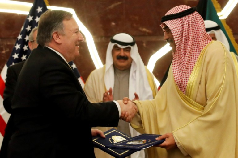U.S. Secretary of State Mike Pompeo shakes hands with Kuwait''s Foreign Minister Sheikh Sabah Al-Khalid Al-Sabah in Kuwait