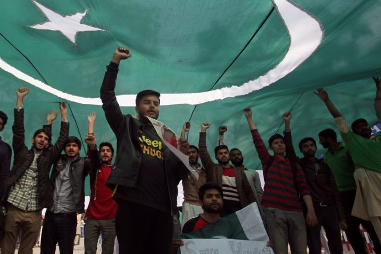 national flag Pakistan during a march in Lahore, Pakistan February 28, 2019.