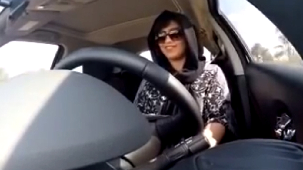 This November 2014 still from a video released by Loujain al-Hathloul shows her driving towards the UAE-Saudi Arabia border before her first arrest [Screenshot/Loujain al-Hathloul/] 