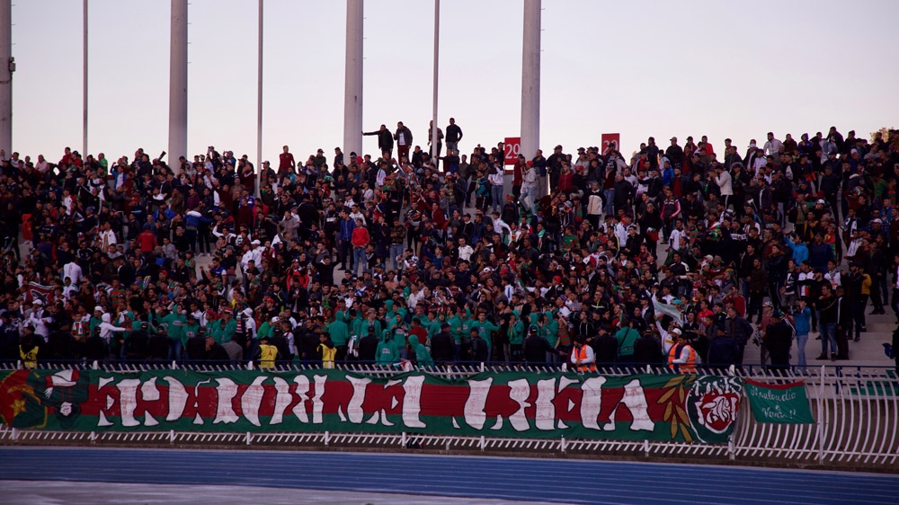 Algerian football has a saying that the spectacle is not on the pitch but in the stands [Maher Mezahi/Al Jazeera]