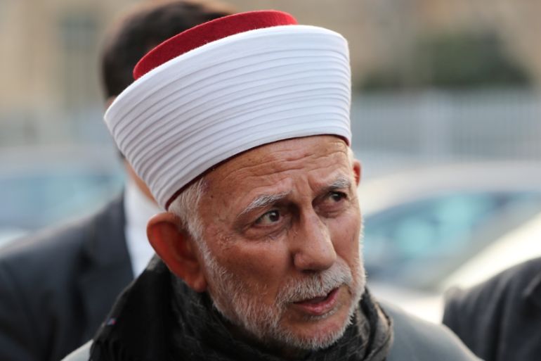 Sheikh Abdel-Azeem Salhab, looks on after he was released by Israeli police at a police station in Jerusalem