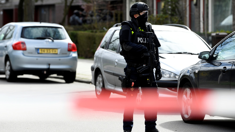 Heavily armed police patrolled the streets of Utrecht and people were urged to stay inside. [Piroschka van de Wouw/Reuters]