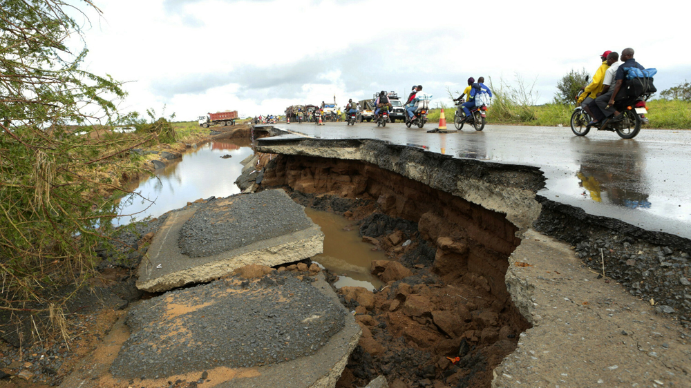 Roads leading to Beira are damaged or washed away altogether which is complicating aid efforts [Tsvangirayi Mukwazhi/AP]