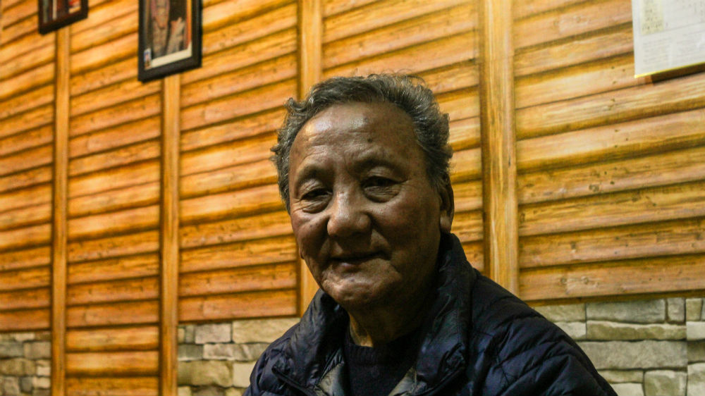Lobsang Yonden was arrested at 16 and tortured by the Chinese authorities [Angel Martinez/Al Jazeera]