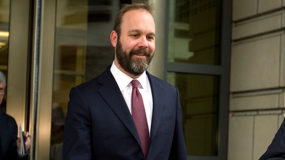 In this February 23, 2018 photo, Rick Gates leaves federal court in Washington [File: Jose Luis Magana/AP]