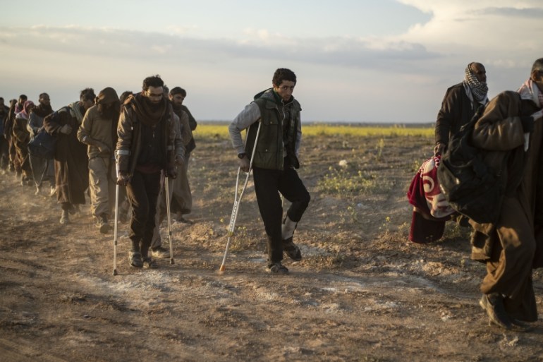 Syria - Suspected ISIL fighters in Baghouz