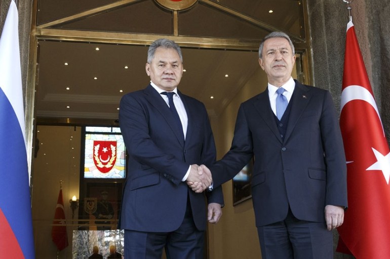 Turkish Defence Minister Hulusi Akar, right, and Russia''s Defense Minister Sergei Shoigu