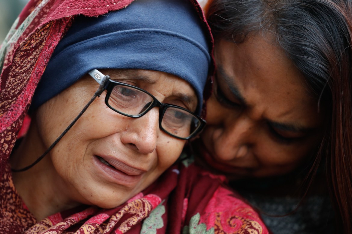 A woman who lost her husband during Friday''s mass shootings cries outside an information center for families, Saturday, March 16, 2019, in Christchurch, New Zealand. (AP Photo/Vincent Thian)