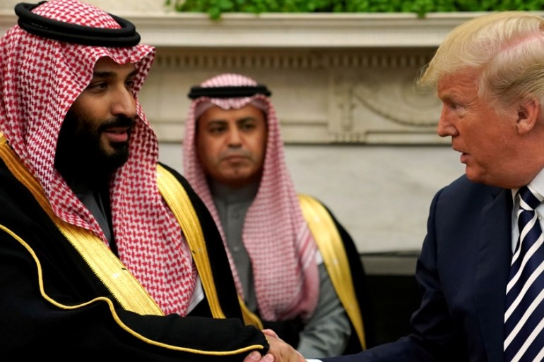 FILE PHOTO: U.S. President Donald Trump shakes hands with Saudi Arabia''s Crown Prince Mohammed bin Salman in the Oval Office at the White House in Washington