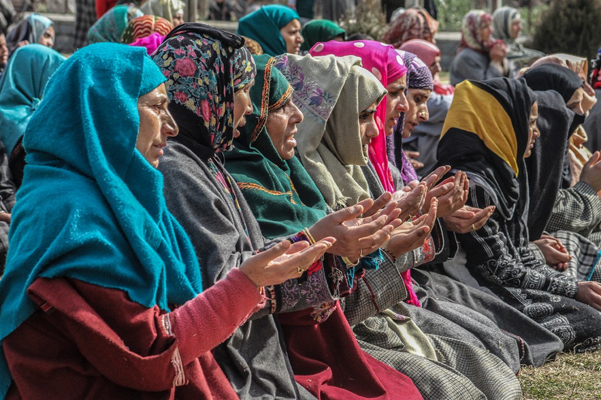 Women pray outside shrine in Anantnag town of South Kashmir. Due to continuing turmoil, women in Kashmir have been going through immense hardships. For instance the mother who loses her son is being s