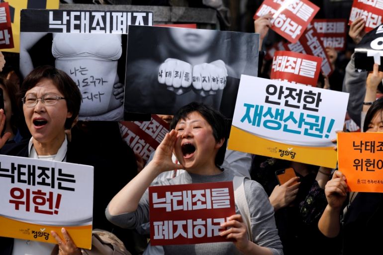 Anti-abortion law protesters react after hearing the court ruling as they take part in a rally to demand the abolition of the abortion law in front of the constitutional court in Seoul