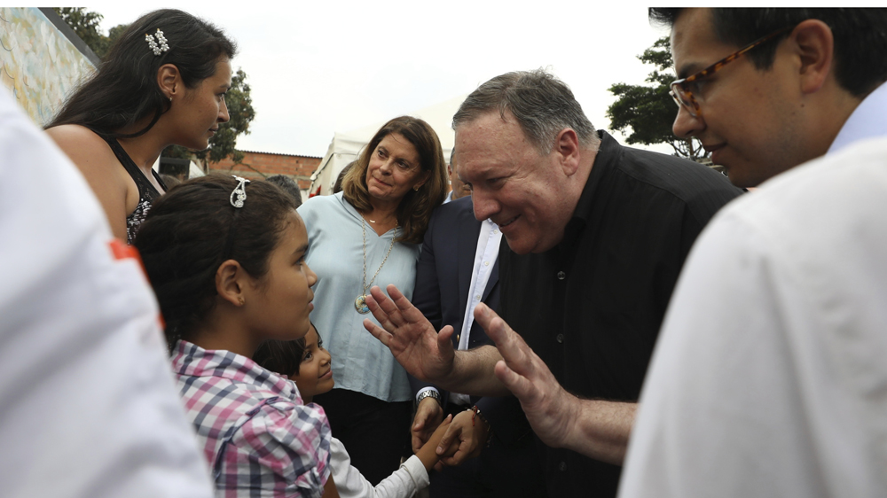 US Secretary of State Mike Pompeo met with Venezuelan refugees in La Parada near Cucuta, Colombia on Sunday. [Fernando Vergara/AP]