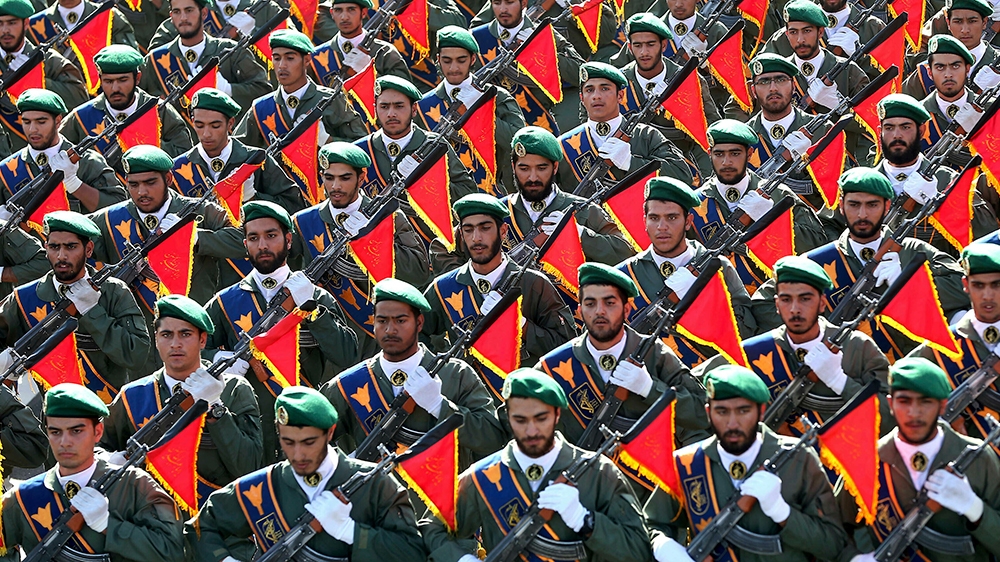 Iran's Revolutionary Guard troops march in a military parade marking the 36th anniversary of Iraq's 1980 invasion of Iran, in front of the shrine of late revolutionary founder Ayatollah Khomeini, just