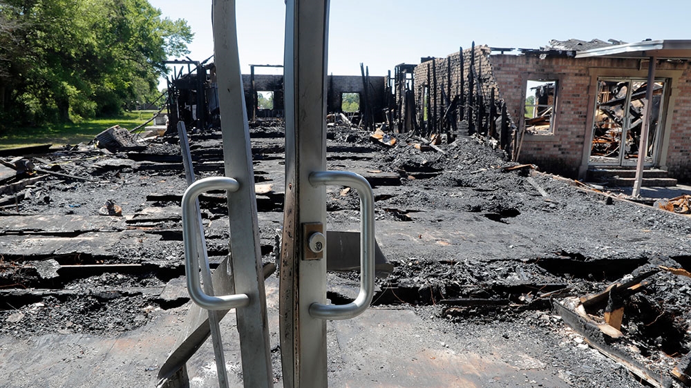 The burned ruins of the Greater Union Baptist Church, one of three that recently burned down in St Landry Parish, are seen in Opelousas, Louisiana [Gerald Herbert/AP Photo] 