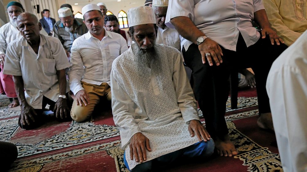 Muslims attend prayers at the Kollupitiya Jummah Masjid in Colombo [Dinuka Liyanawatte/Reuters]
