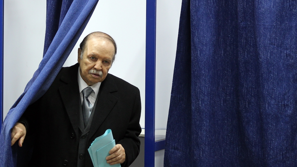 Bouteflika comes out from a polling booth before casting his vote at a polling station in Algiers, Algeria, 29 November 2012 [File: Mohamed Messara/EPA]