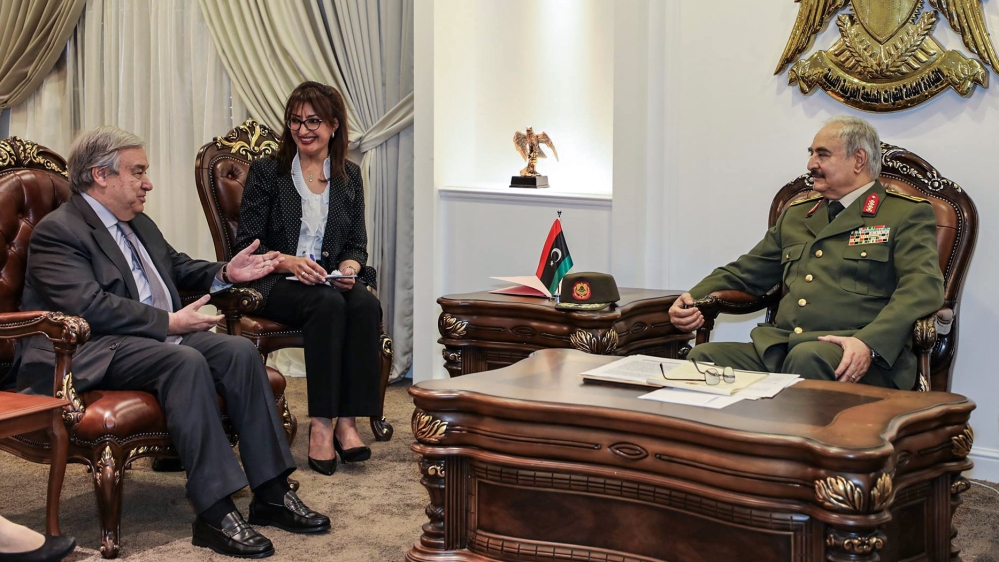 UN Secretary-General Guterres (left) held talks with Haftar (right) in Libya's second most populous city, Benghazi, on Friday [LNA war information division/AFP]
