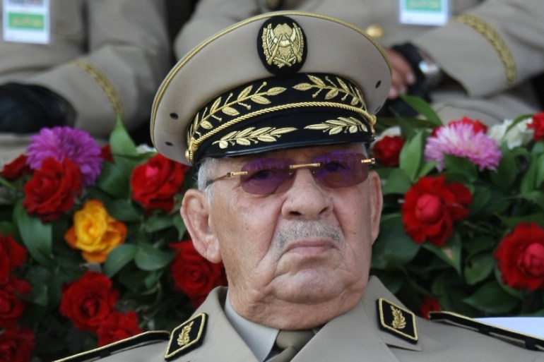 In this Sunday, July 1, 2018 file picture Algerian chief of staff Gen. Ahmed Gaid Salah presides a military parade in Algiers.