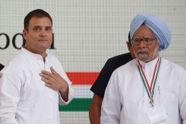 Rahul Gandhi, President of India''s main opposition Congress party, and India''s former Prime Minister Manmohan Singh leave after releasing their party''s election manifesto for the April/May general ele