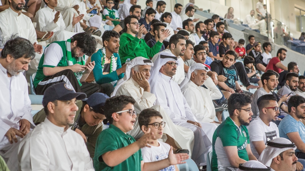 Supporters attend a football match at a multi-purpose stadium in Al Salmiya, Kuwait [Sebastian Castelier/Al Jazeera]