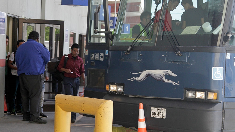 An asylum seeker from Guatemala boards a Greyhound bus in El Paso, Texas [Cedar Attanasio/AP Photo] 