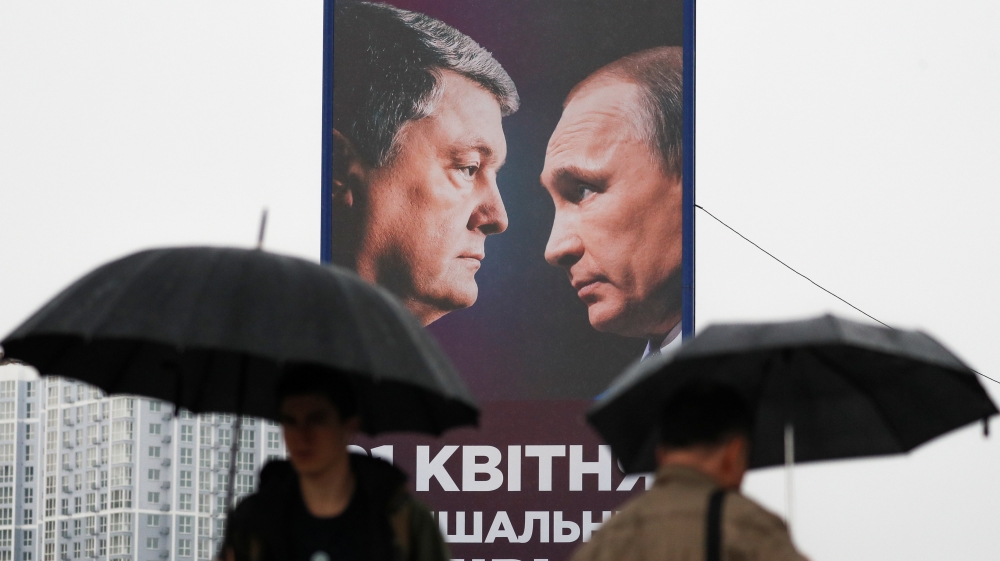 Poroshenko claims he is the only candidate capable of standing up to Putin [Valentyn Ogirenko/Reuters]