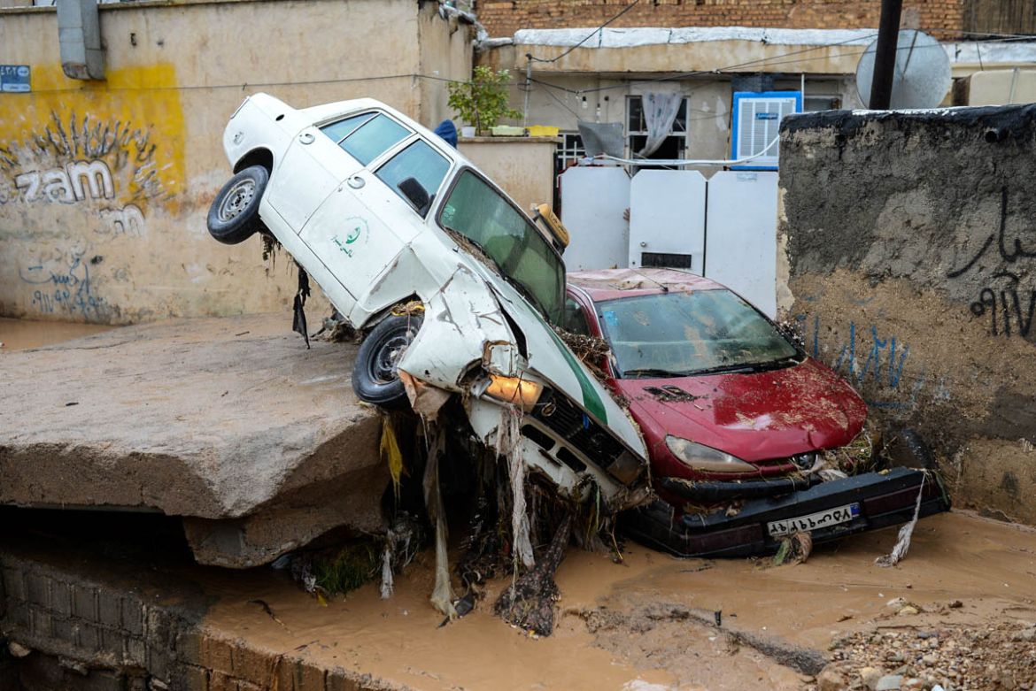 Damaged vehicles are seen after a flash flooding in Shiraz, Iran, March 26, 2019. Tasnim News Agency/via REUTERS ATTENTION EDITORS - THIS PICTURE WAS PROVIDED BY A THIRD PARTY