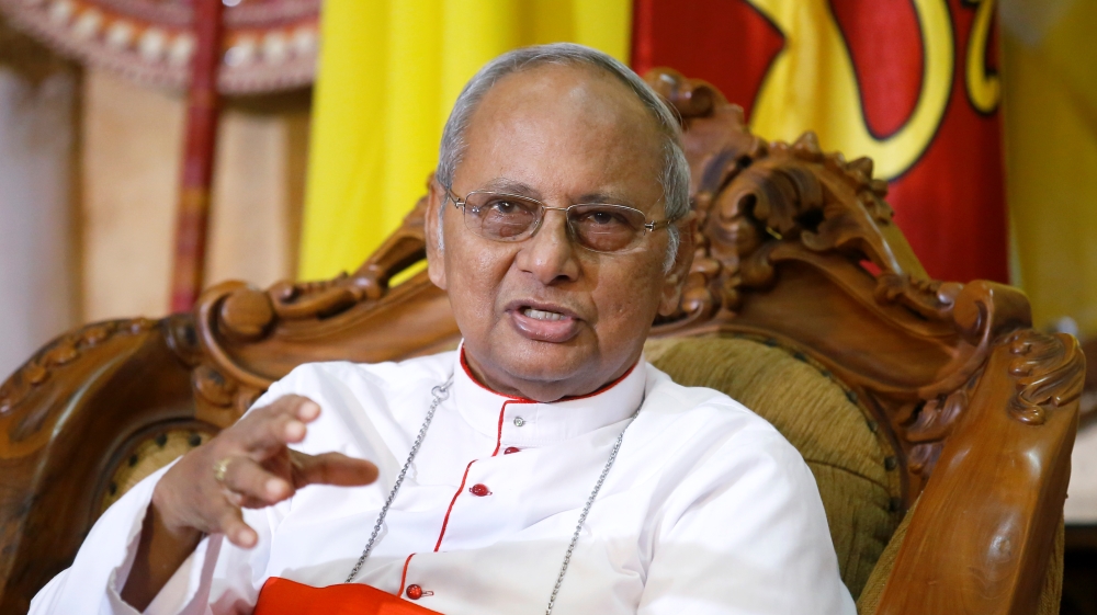 Cardinal Malcolm Ranjith, the archbishop of Colombo, attends a news conference at his residence in Colombo [Thomas Peter/ Reuters]