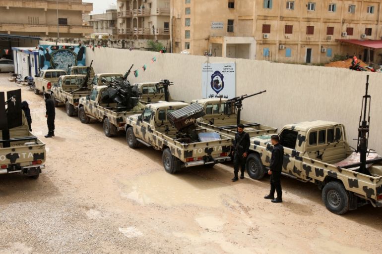 Members of the Libyan pro-internationally recognised government forces check the military vehicles which were confiscated from Libyan commander Khalifa Haftar''s troops, in Zawiyah