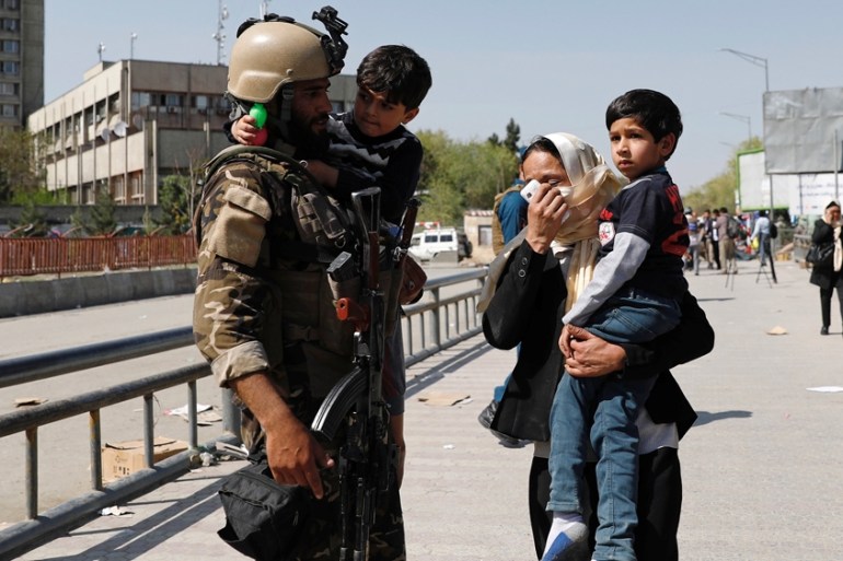 Rescued children are carried from the building of Ministry of Communication and Information Technology in Kabul, Afghanistan April 20, 2019.Reuters/Mohammad Ismail