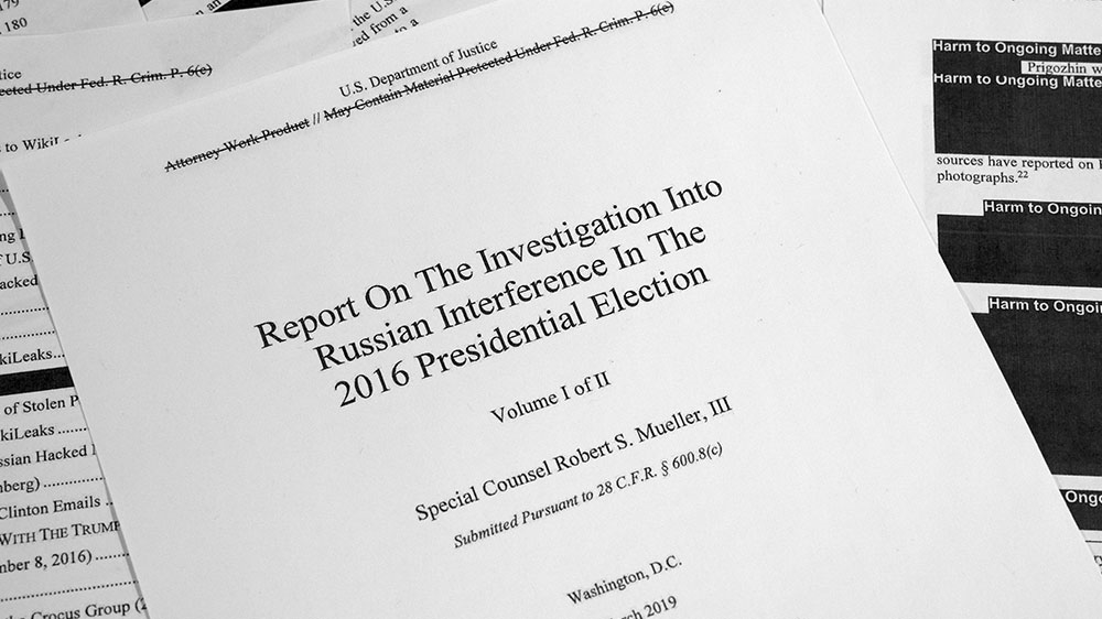 Special Counsel Robert Mueller's redacted report on Russian interference in the 2016 presidential election as released [Jon Elswick/AP Photo]