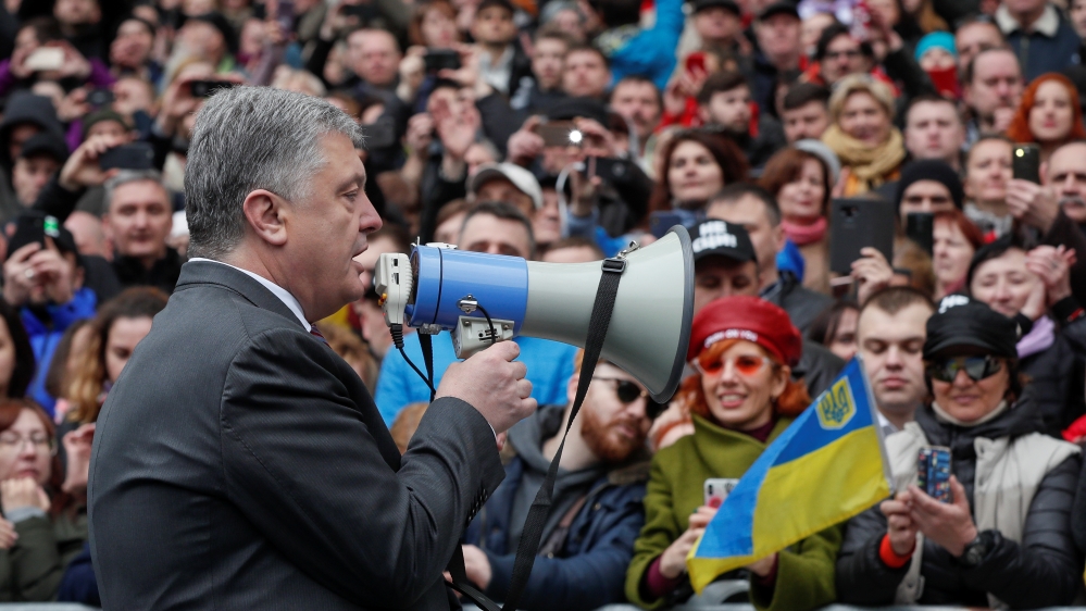Poroshenko accused his rival of avoiding hard-hitting questions [Valentyn Ogirenko/Reuters]