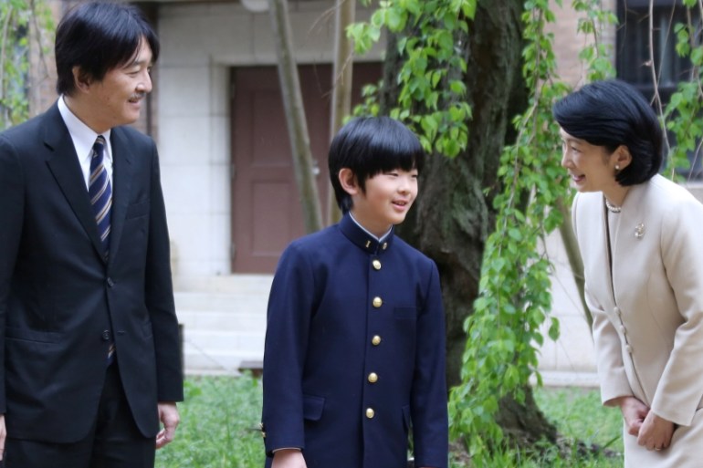 Prince Hisahito talks with his parents Prince Akishino and Princess Kiko at Ochanomizu University junior high school before attending the entrance ceremony in Tokyo, Japan April 8, 2019. Koji Sasahara