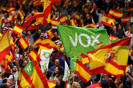 Supporters of Spain&#39;s far-right Vox party wave Spanish flags as they attend a rally ahead of a general election in the Andalusian capital of Seville [File: Marcelo del Pozo/Reuters]