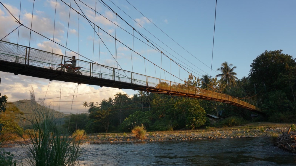 The hanging bridge above Bone River before Tulabolo [Ian Morse/Al Jazeera] [Al Jazeera]